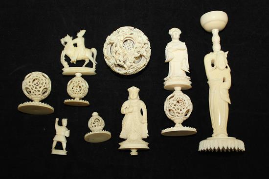 A Chinese export ivory puzzle ball and stand and four similar ivory chess pieces, 19th / early 20th century, 6.5cm - 21cm